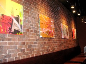 Original works of featured artist Daniel Tacker adorn SOB's walls.