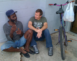Joe Carson (right) talks with a friend