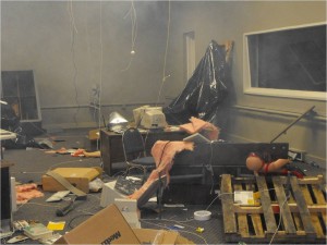 Actual disaster situations are simulated, like a body trapped in rubble.